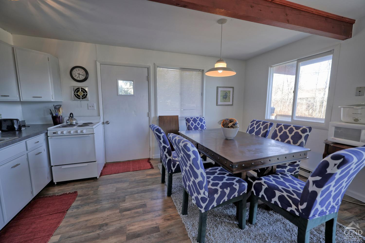 31 Showers Road Hunter, NY 12485 - Photo 25 of 89 a view of a a dining room with furniture window and wooden floor