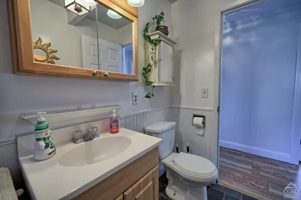a bedroom with a bunk bed and a dresser
