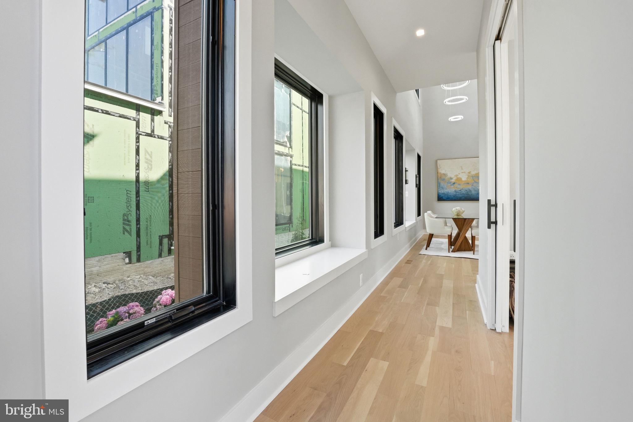 2211 Military Road Arlington, VA 22207 - Photo 6 of 107 Bright corridor with modern windows.