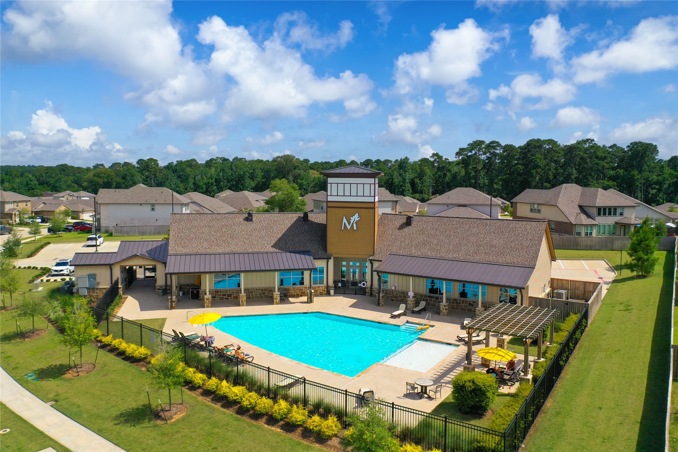 7080 Silverleaf Oak Street Conroe, TX 77304 - Photo 22 of 35 The stunning pool and clubhouse make summers a lot more fun!