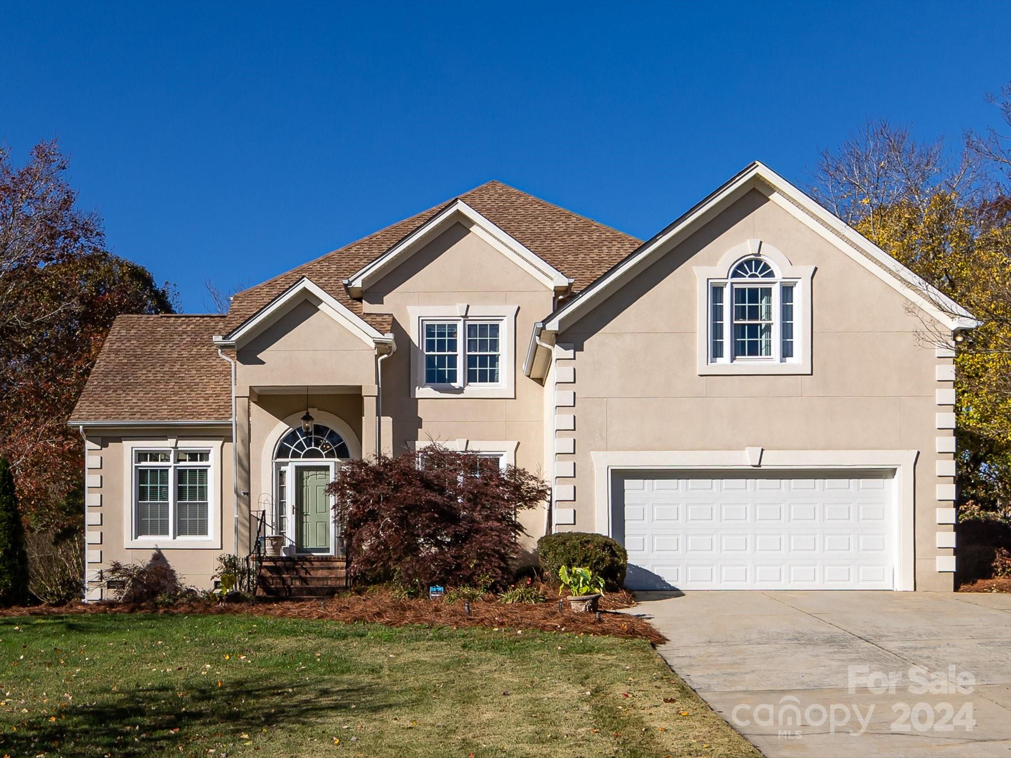 3534 Nestling Lane Fort Mill, SC 29708 - Photo 1 of 44 a front view of a house with a yard and garage