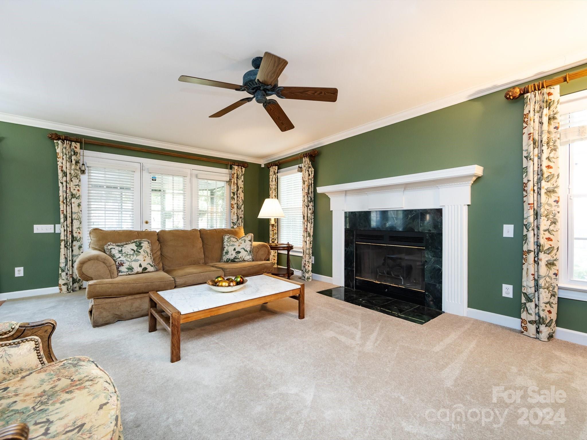 3534 Nestling Lane Fort Mill, SC 29708 - Photo 17 of 44 a living room with furniture and a fireplace