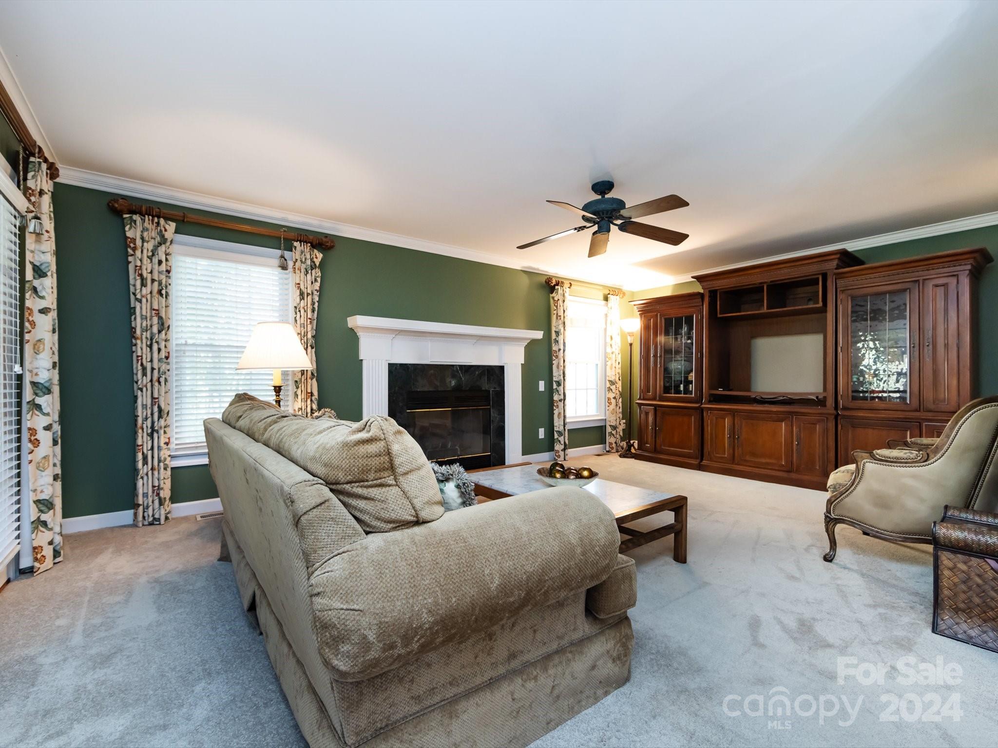 3534 Nestling Lane Fort Mill, SC 29708 - Photo 18 of 44 a living room with furniture and a fireplace