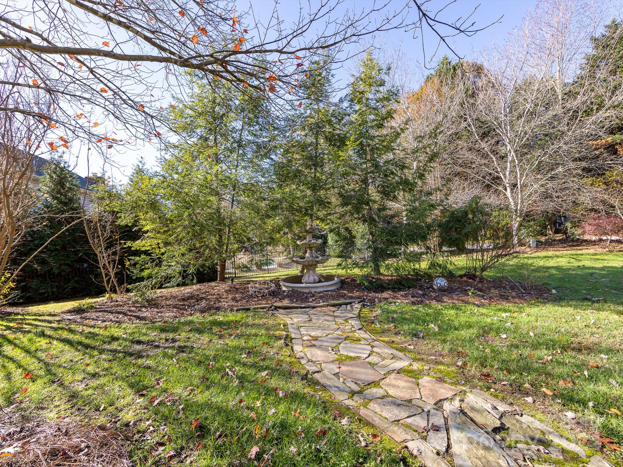 3534 Nestling Lane Fort Mill, SC 29708 - Photo 39 of 44 a view of a yard with plants and trees