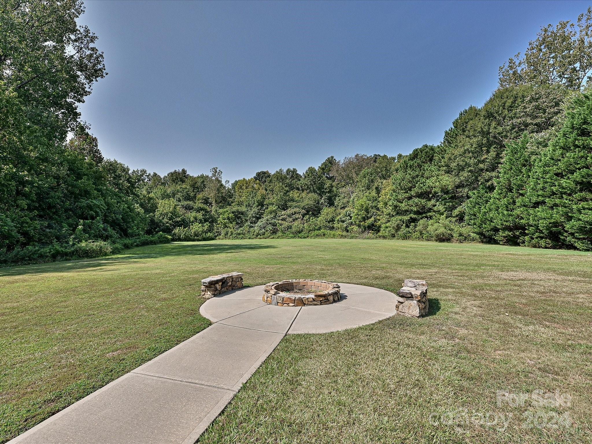 3534 Nestling Lane Fort Mill, SC 29708 - Photo 42 of 44 a view of a lake with a yard