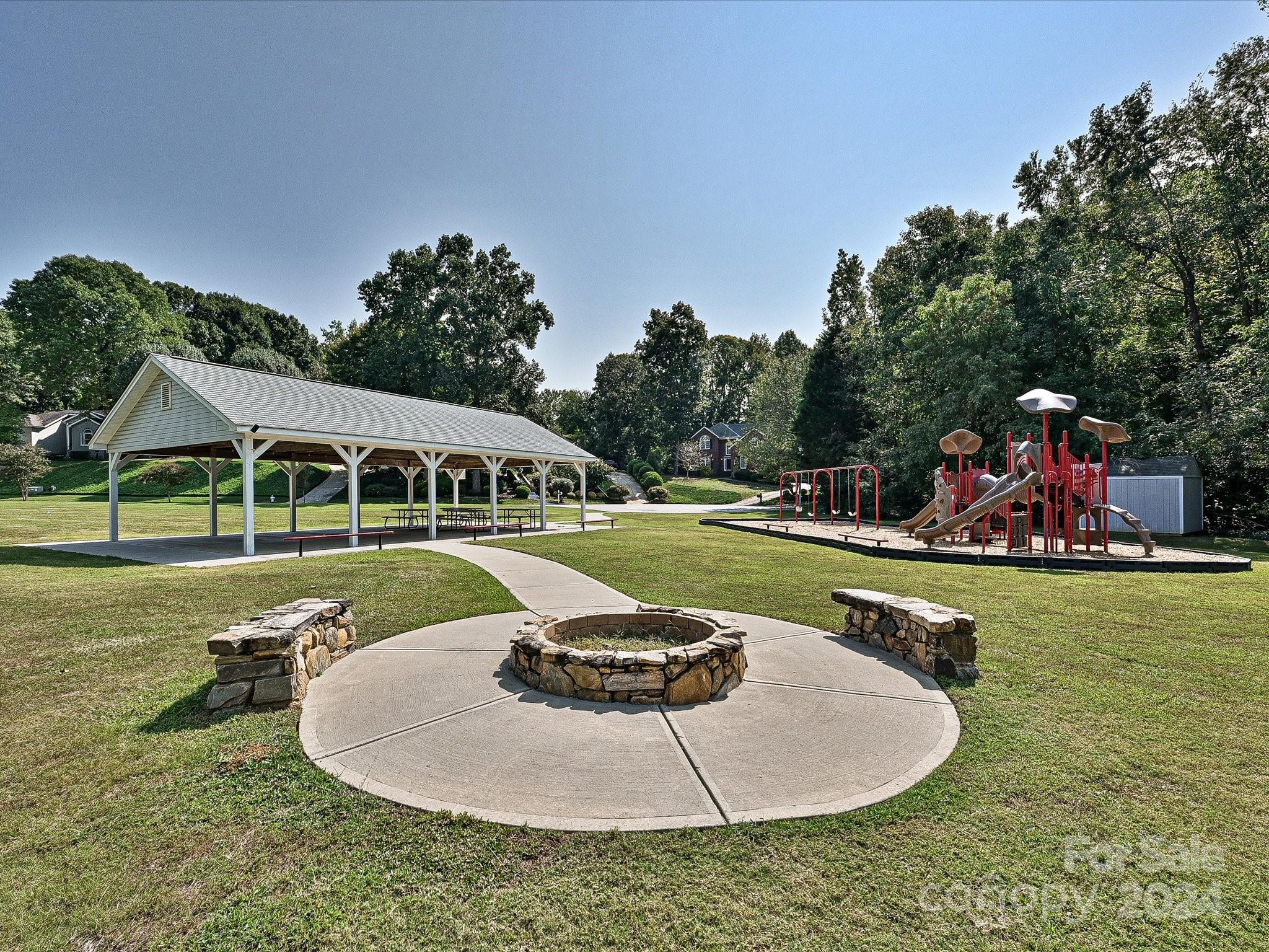 3534 Nestling Lane Fort Mill, SC 29708 - Photo 43 of 44 a view of a swimming pool with lawn chairs and plants