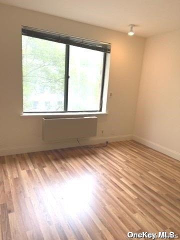 141 Great Neck Road, Unit 3A Great Neck, NY 11021 - Photo 12 of 15 a view of an empty room and window