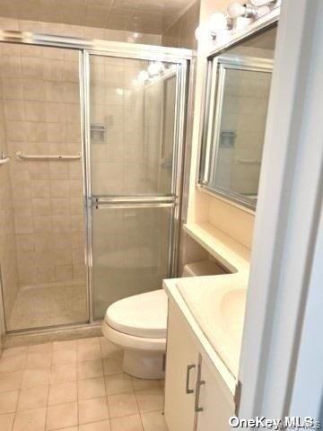 141 Great Neck Road, Unit 3A Great Neck, NY 11021 - Photo 14 of 15 a bathroom with a shower a toilet and a shower