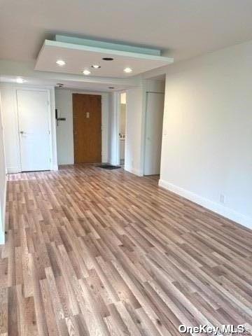 141 Great Neck Road, Unit 3A Great Neck, NY 11021 - Photo 2 of 15 a view of an empty room and wooden floor