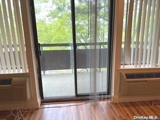 141 Great Neck Road, Unit 3A Great Neck, NY 11021 - Photo 5 of 15 a view of an empty room and window