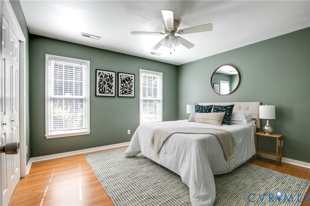 3114 Shiloh Church Road Midlothian, VA 23112 - Photo 15 of 34 Wood-finish flooring with white trim, dual windows