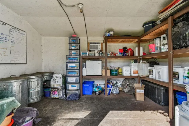 a backyard of a house with yard and outdoor seating
