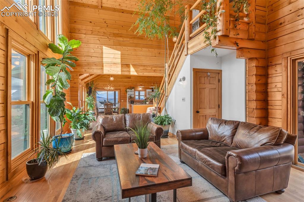 1350 Mitchell Mountain Road Westcliffe, CO 81252 - Photo 13 of 45 a view of a patio with couches and potted plants