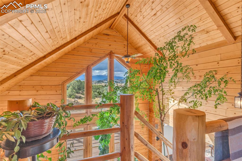 1350 Mitchell Mountain Road Westcliffe, CO 81252 - Photo 17 of 45 a view of a house with a cars park