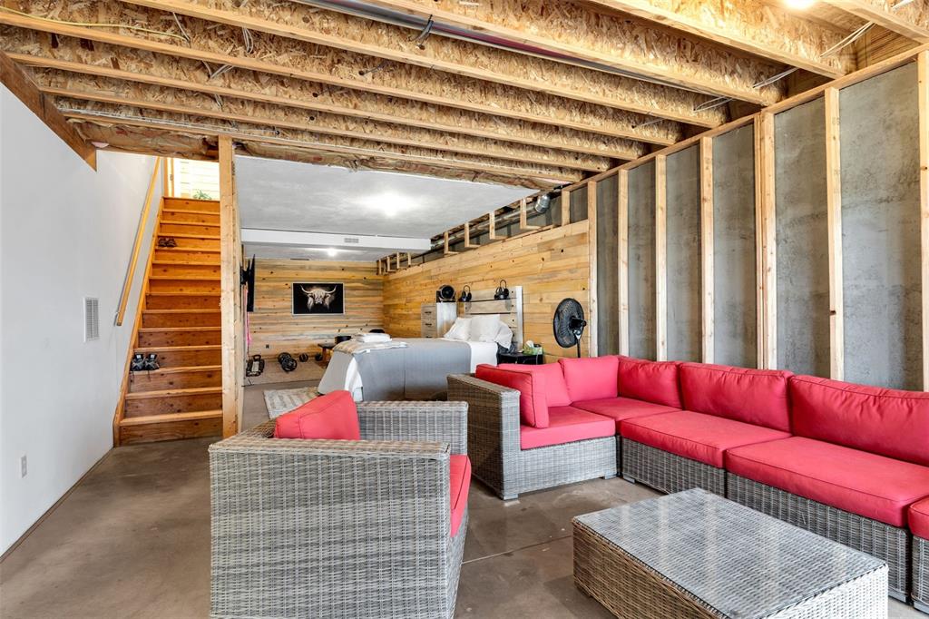 1350 Mitchell Mountain Road Westcliffe, CO 81252 - Photo 29 of 45 a living room with furniture and a chandelier