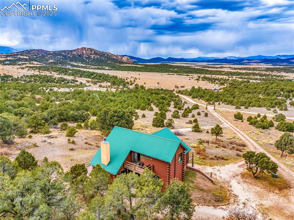 1350 Mitchell Mountain Road Westcliffe, CO 81252 - Photo 41 of 45 a view of a city with an ocean beach