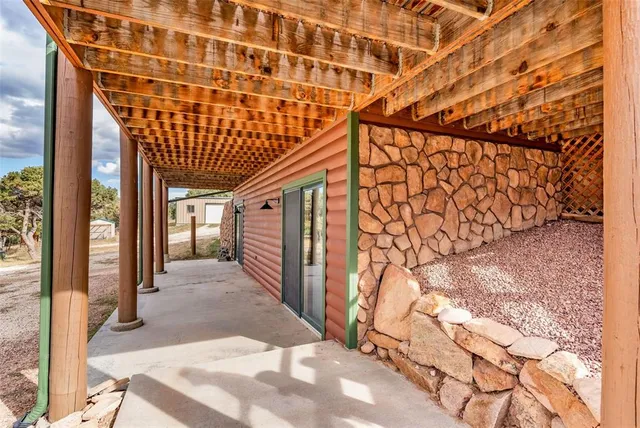 a view of a porch with a backyard