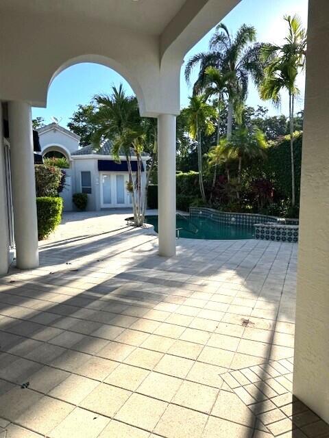 3529 Northwest Clubside Circle Boca Raton, FL 33496 - Photo 4 of 11 Courtyard and Pool