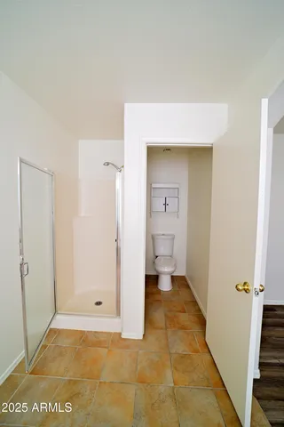 a view of small space with racks on the wall