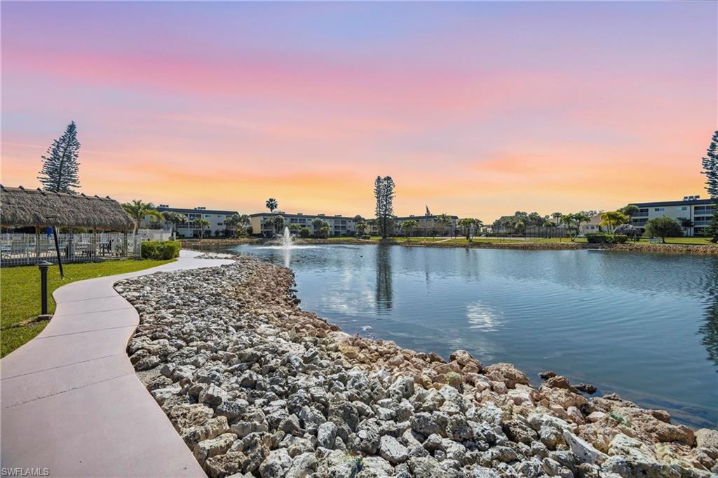 1010 Manatee Road, Unit B304 Naples, FL 34114 - Photo 18 of 24 a view of a lake with a outdoor space