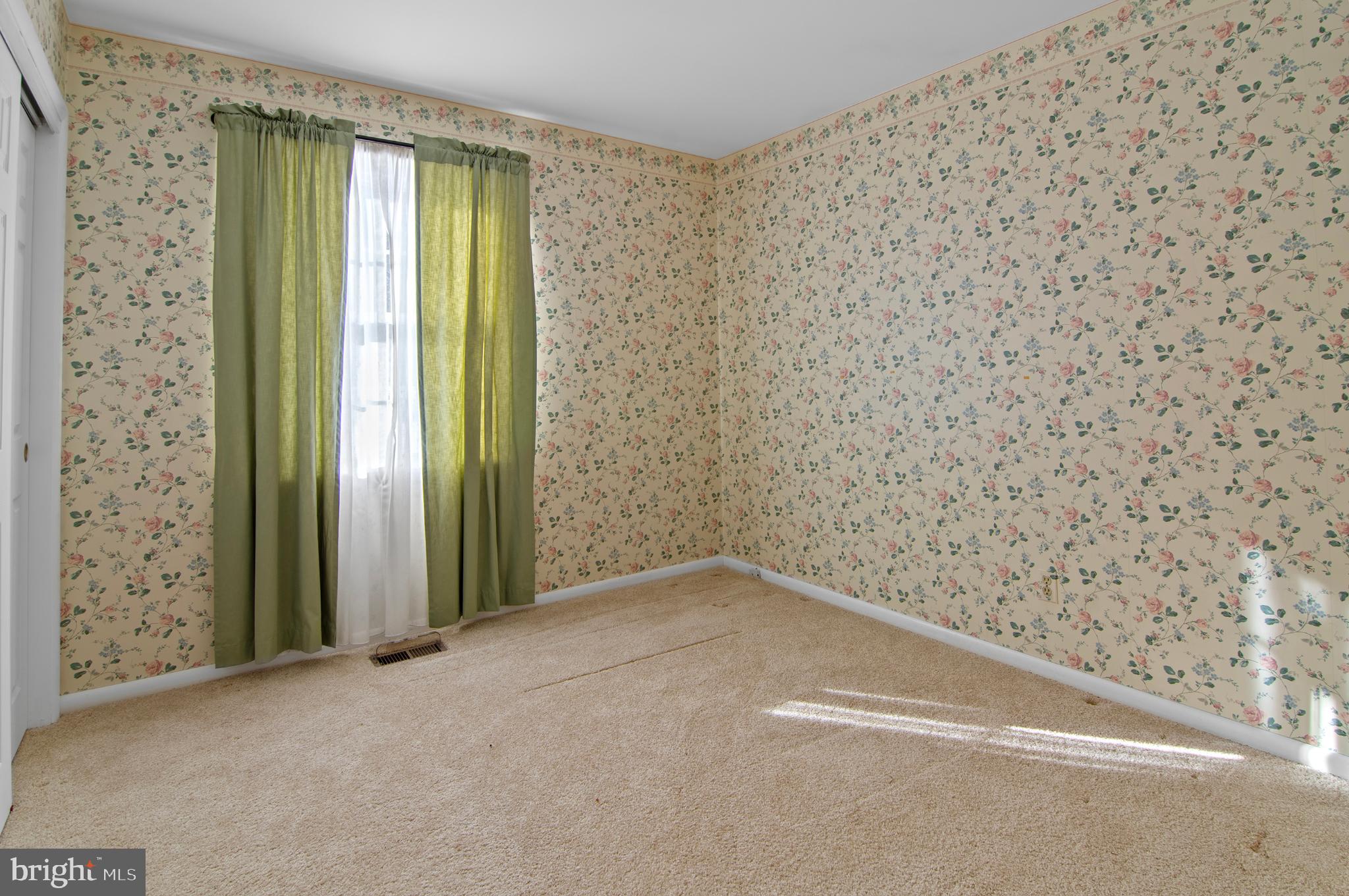 3005 Moores Road Baldwin, MD 21013 - Photo 26 of 56 Bright, floral-walled room with natural light.