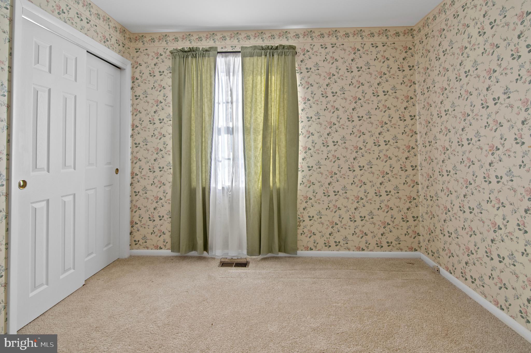 3005 Moores Road Baldwin, MD 21013 - Photo 27 of 56 Charming room with floral wallpaper and light.