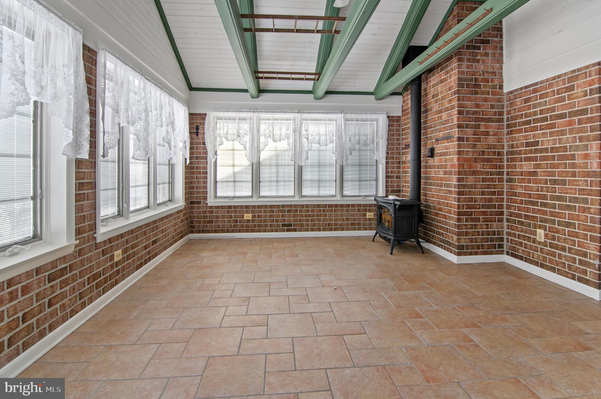 3005 Moores Road Baldwin, MD 21013 - Photo 42 of 56 Bright sunlit space with charming brick walls.