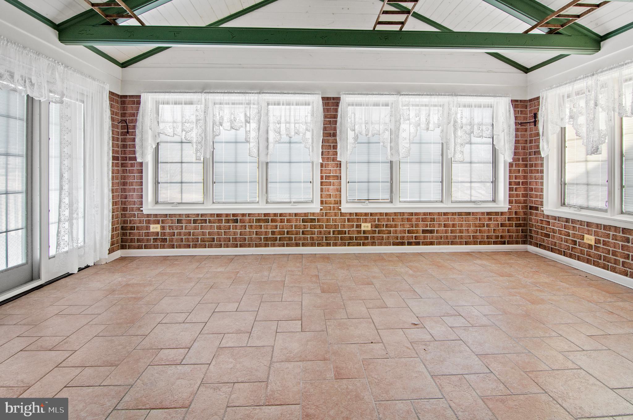 3005 Moores Road Baldwin, MD 21013 - Photo 43 of 56 Bright sunlit space with charming brick walls.