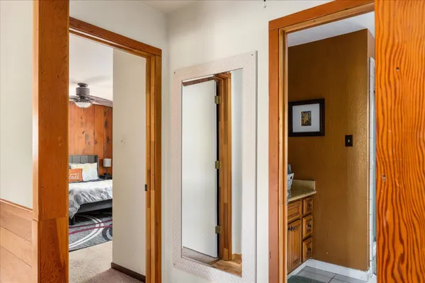 a view of a bedroom from a hallway