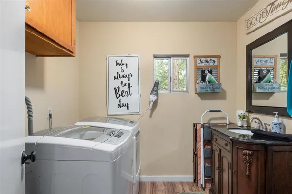 a utility room with dryer and washer