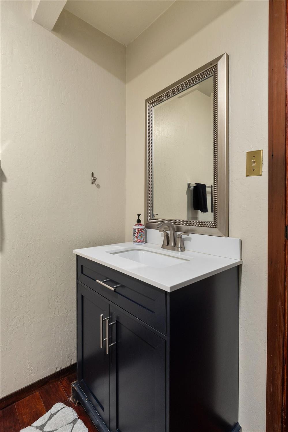 485 Moran Road Arnold, CA 95223 - Photo 32 of 49 a bathroom with a sink and a mirror
