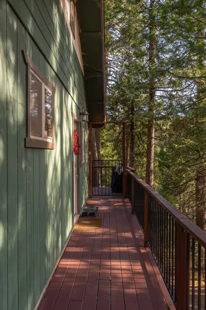 a view of a pathway with a balcony