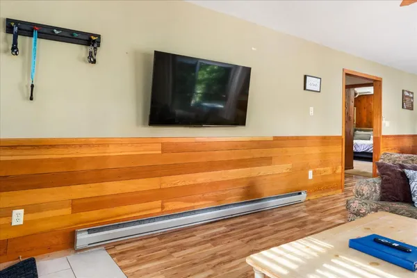 a view of a living room with a flat screen tv