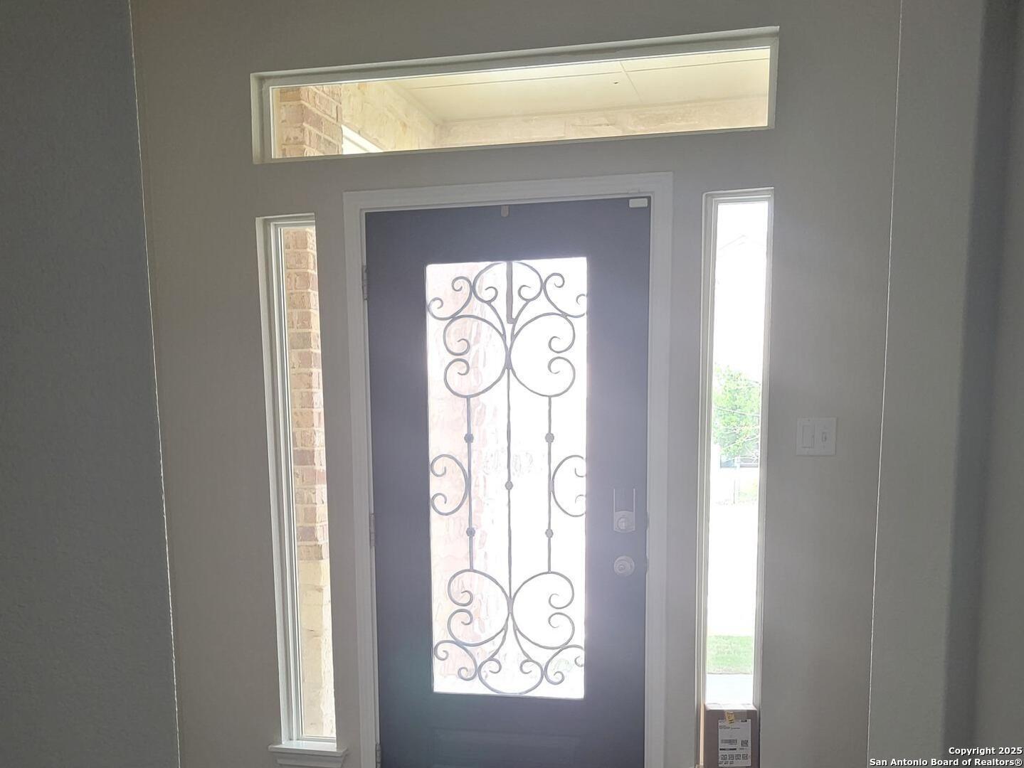 609 Steele Shallows Cibolo, TX 78108 - Photo 29 of 37 a front door view with a glass door and door