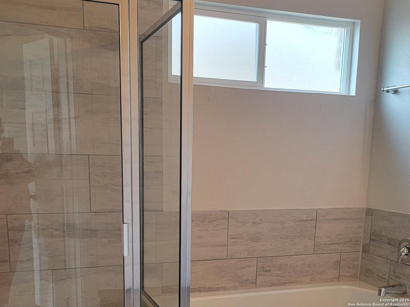 609 Steele Shallows Cibolo, TX 78108 - Photo 30 of 37 a bathroom with a shower