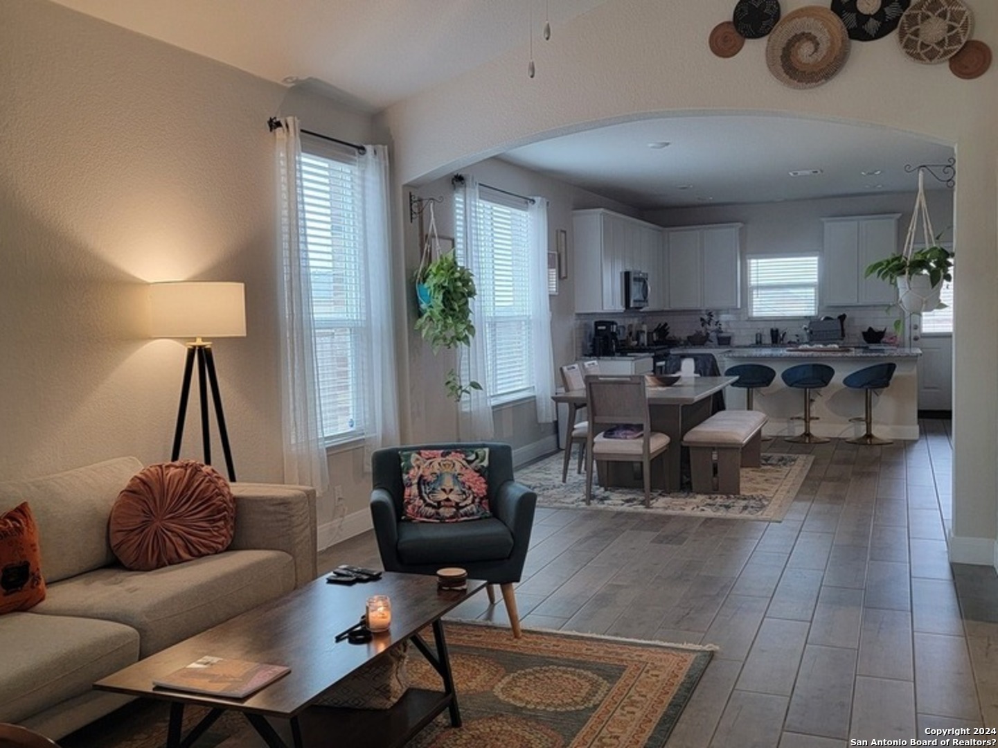 609 Steele Shallows Cibolo, TX 78108 - Photo 3 of 37 a living room with furniture a rug and a lamp