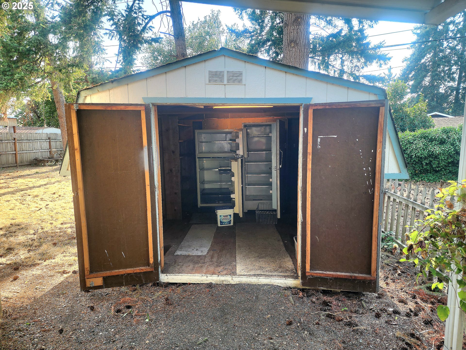1125 58th Street, Unit 6 Springfield, OR 97478 - Photo 24 of 27 a view of a wooden door in front of a house