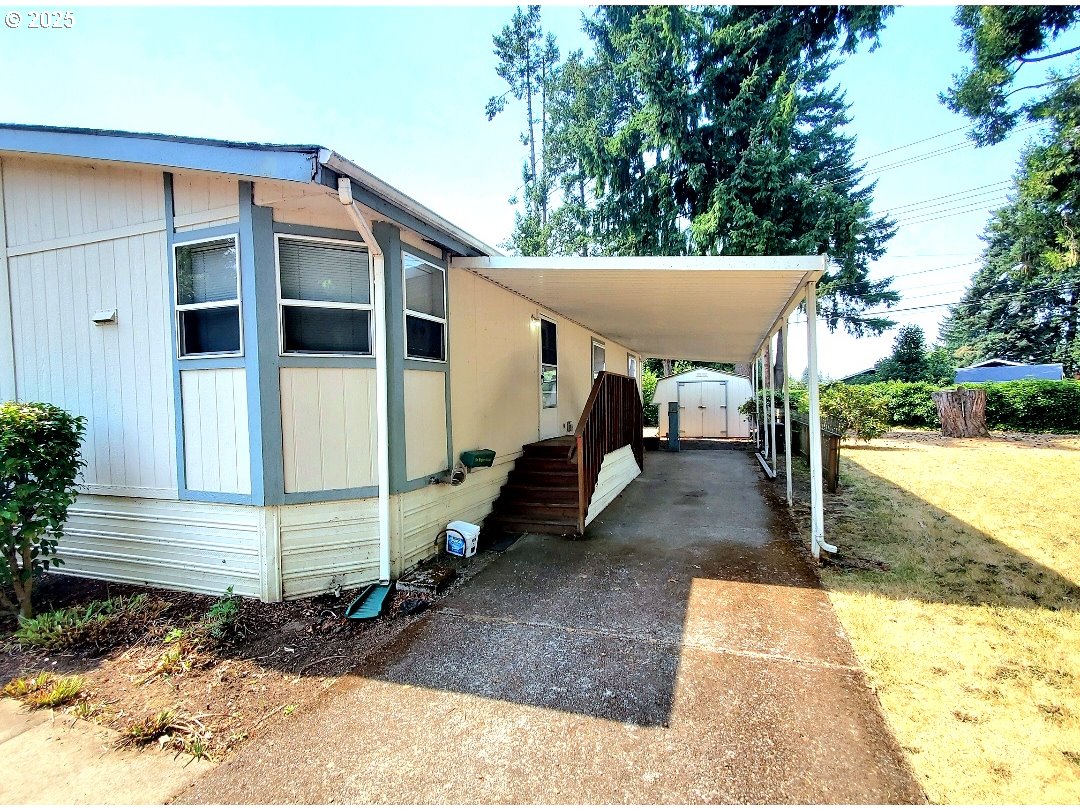 1125 58th Street, Unit 6 Springfield, OR 97478 - Photo 3 of 27 a view of a house with a yard