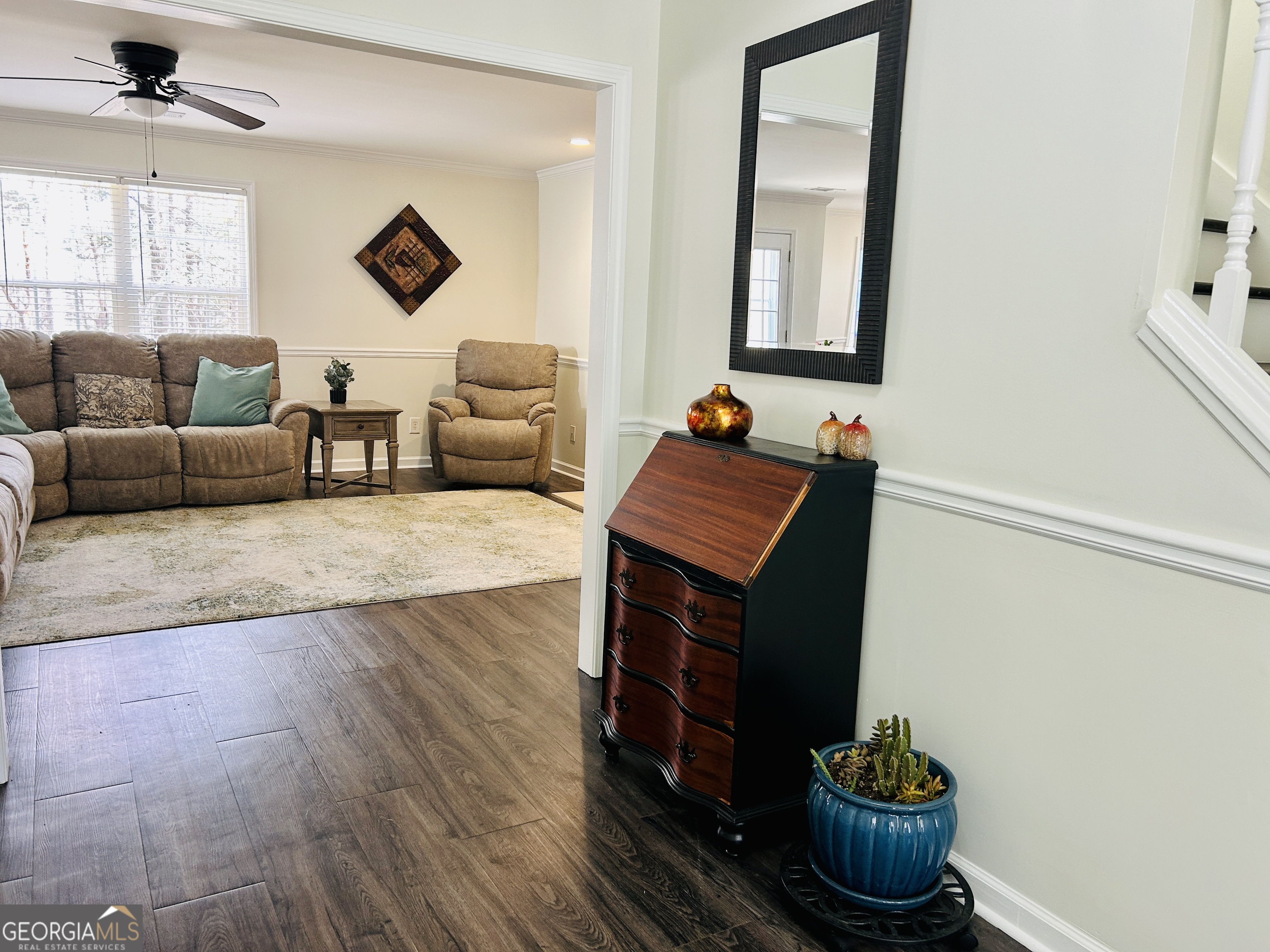 129 Rockwind Way Demorest, GA 30535 - Photo 19 of 45 a living room with furniture and a potted plant