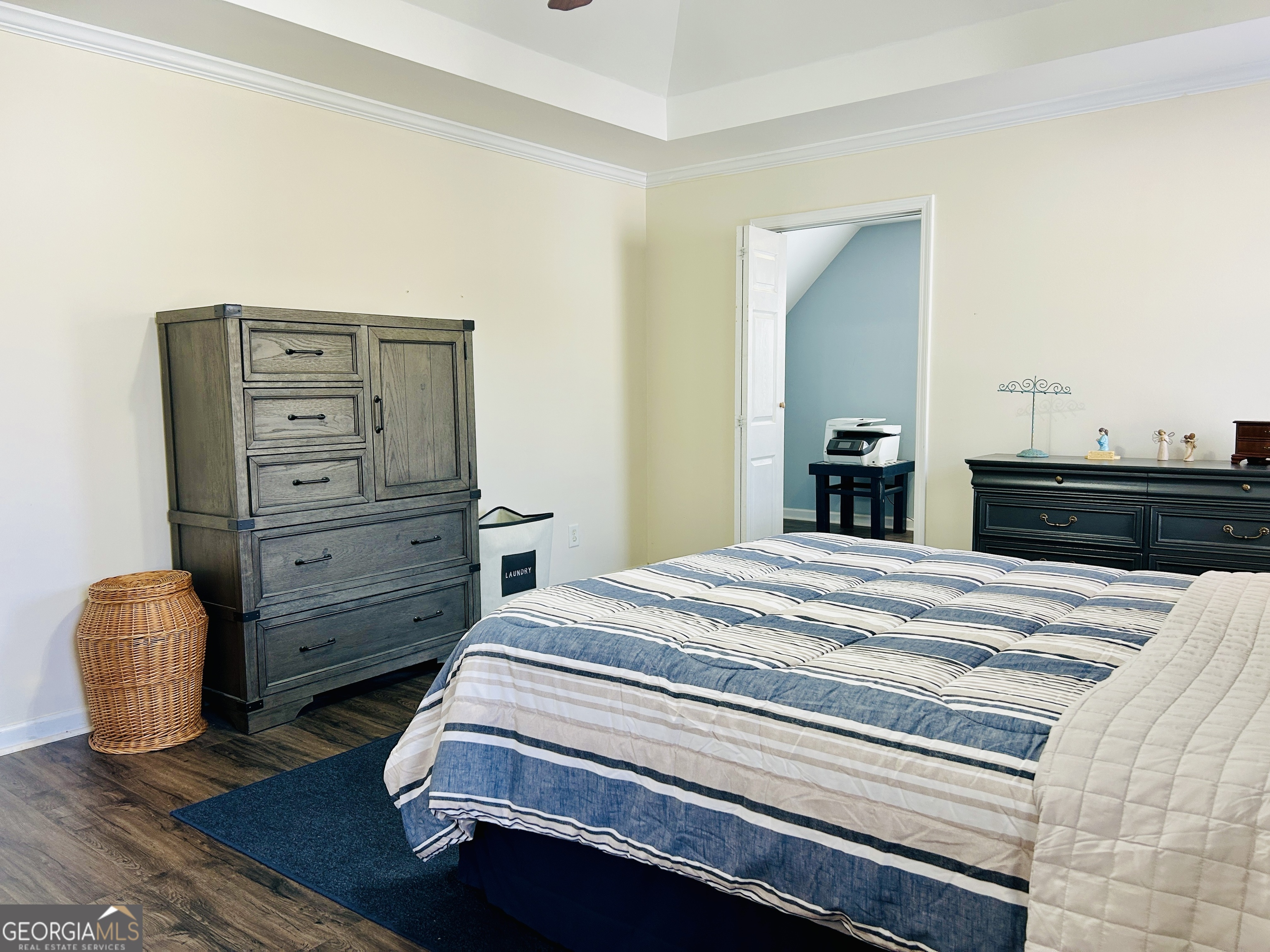 129 Rockwind Way Demorest, GA 30535 - Photo 23 of 45 a bedroom with a bed and a dresser