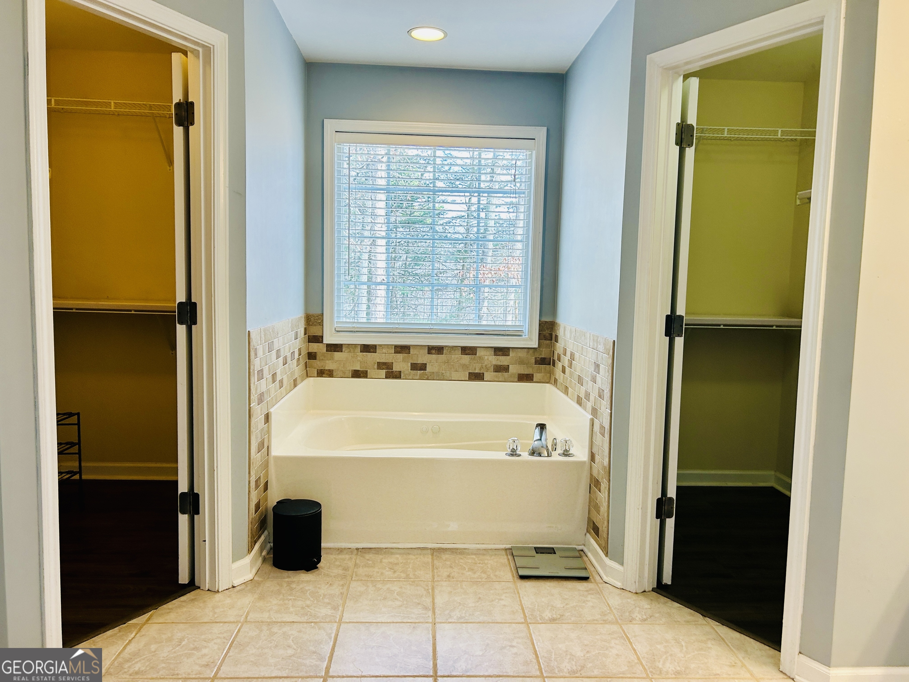 129 Rockwind Way Demorest, GA 30535 - Photo 26 of 45 a spacious bathroom with a bathtub and shower