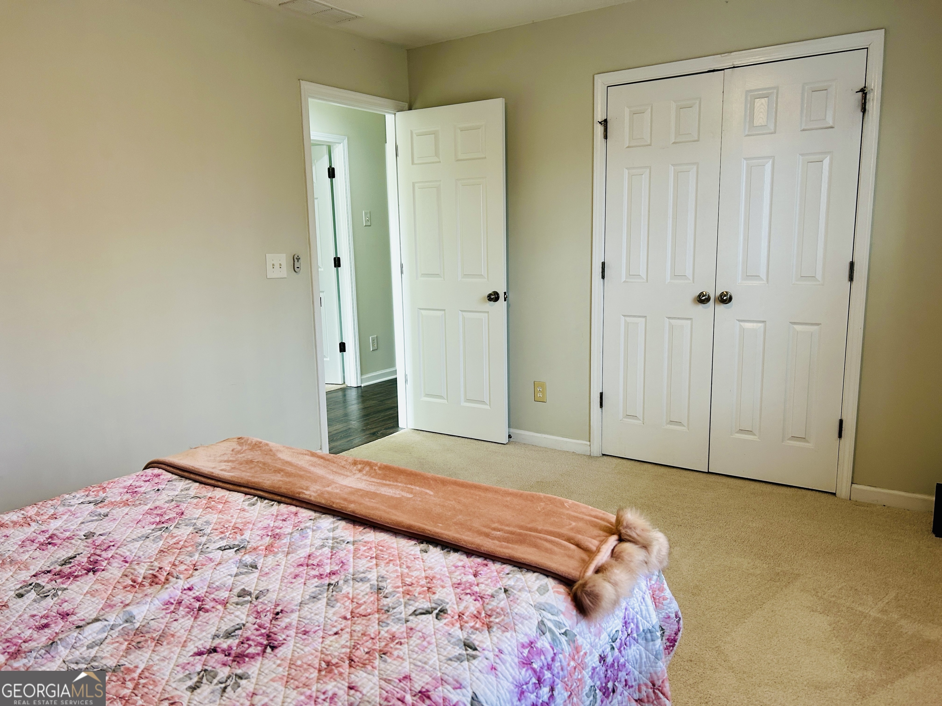 129 Rockwind Way Demorest, GA 30535 - Photo 32 of 45 a bedroom with a bed and a shower