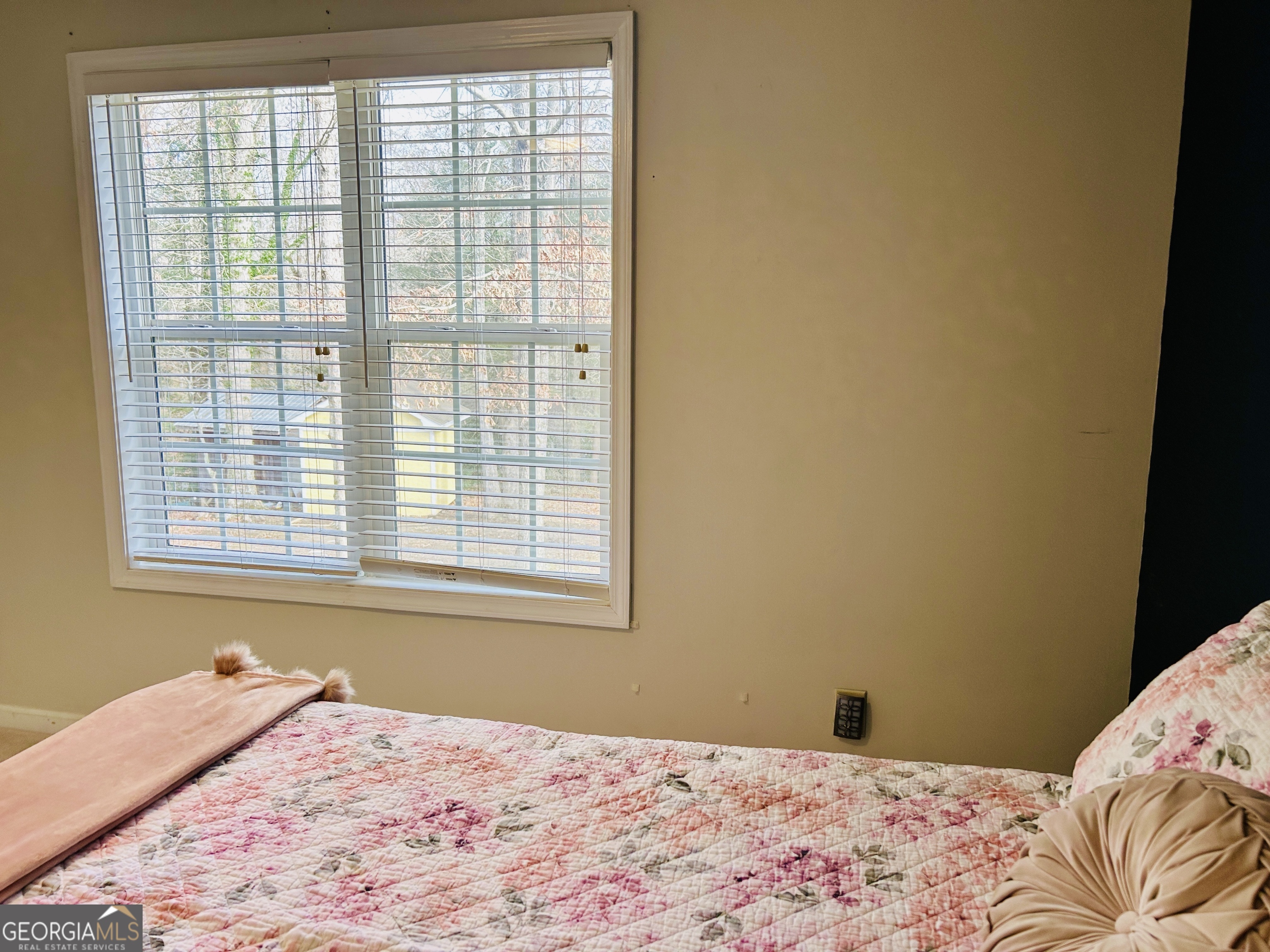 129 Rockwind Way Demorest, GA 30535 - Photo 33 of 45 a bedroom with a bed and a window