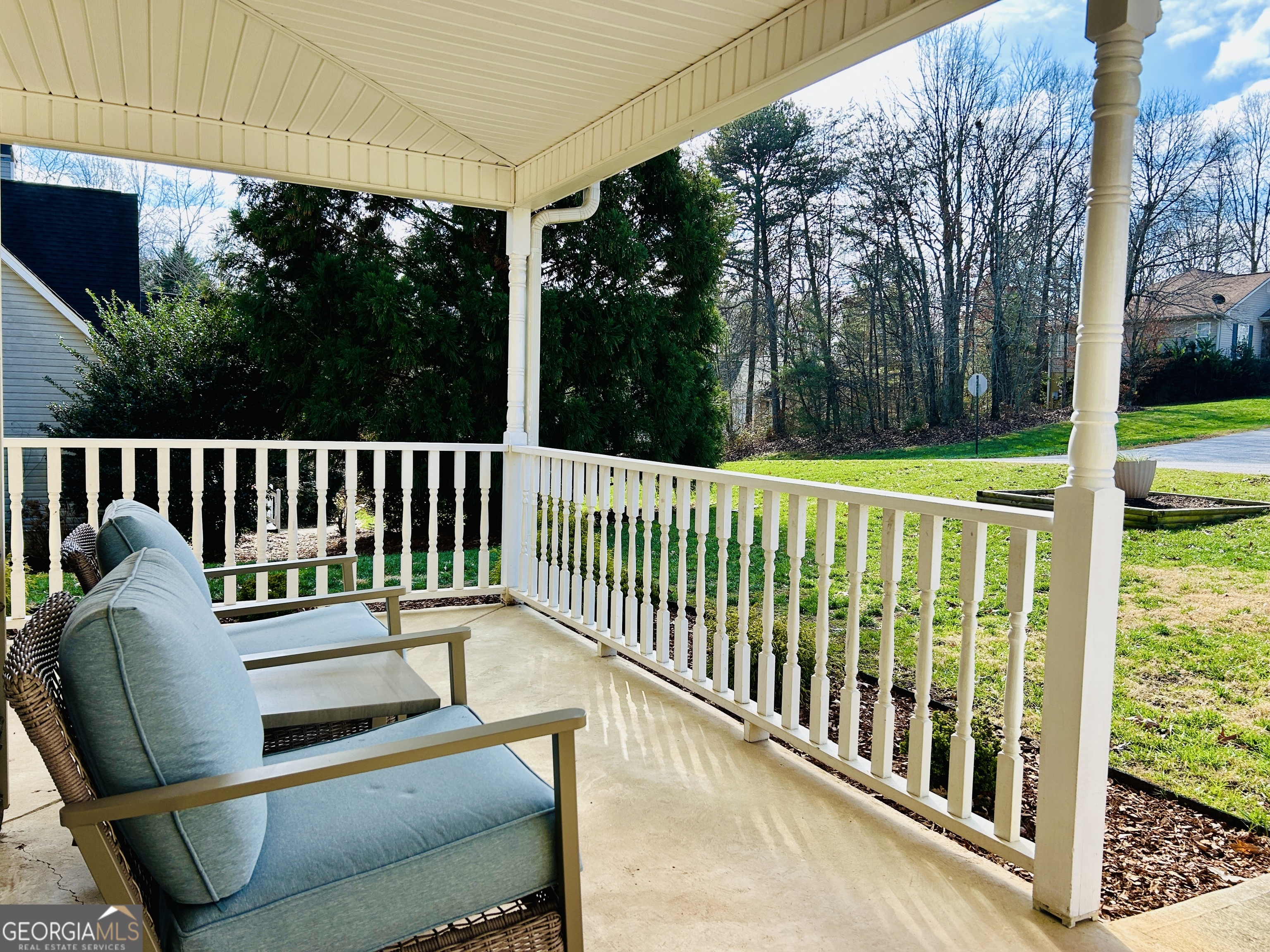 129 Rockwind Way Demorest, GA 30535 - Photo 38 of 45 a view of a chair in the deck