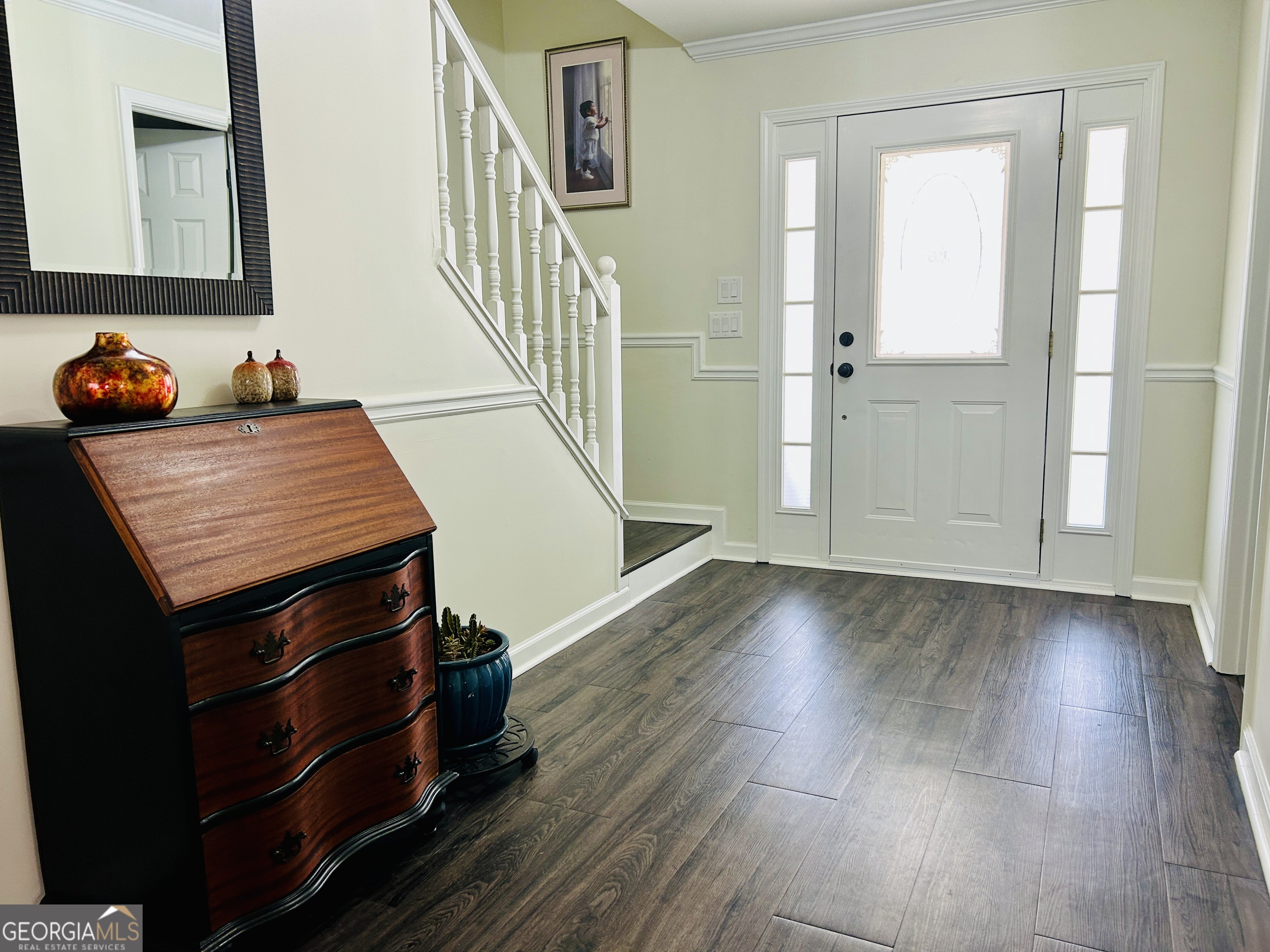 129 Rockwind Way Demorest, GA 30535 - Photo 6 of 45 a view of a hallway with wooden floor and staircase