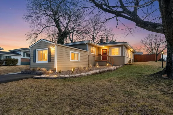 a view of a house with a big yard