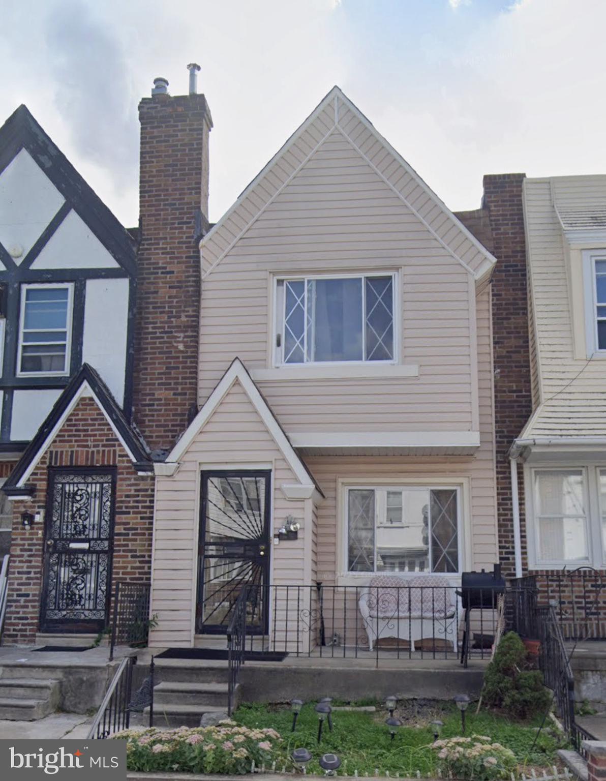 7816 Temple Road Philadelphia, PA 19150 - Photo 1 of 24 a view of house with garden