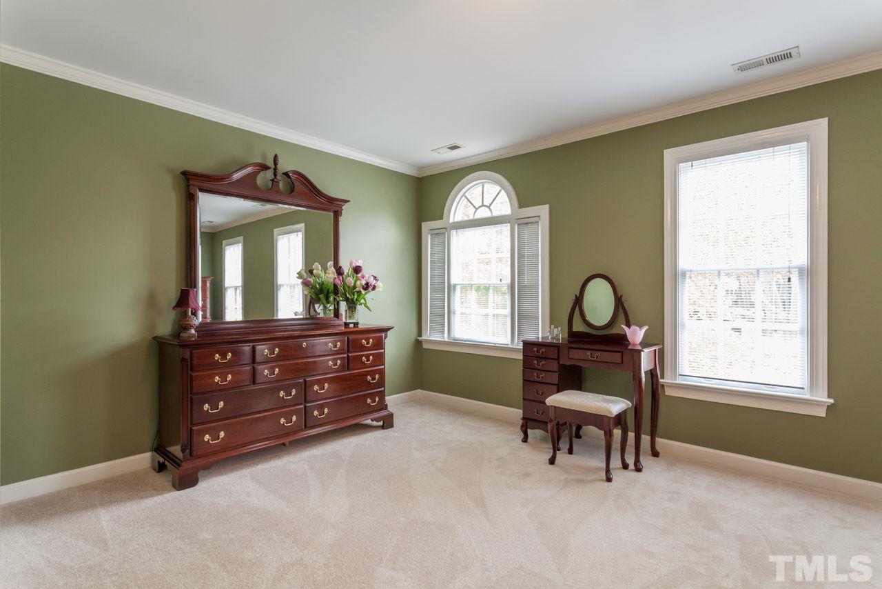 2408 Wertherson Lane Raleigh, NC 27613 - Photo 13 of 25 a living room with furniture and a window