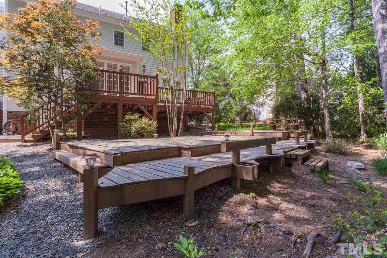 2408 Wertherson Lane Raleigh, NC 27613 - Photo 21 of 25 a view of a backyard with sitting area