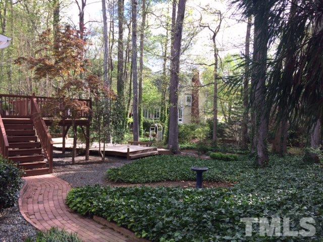 2408 Wertherson Lane Raleigh, NC 27613 - Photo 22 of 25 a view of a park with large trees